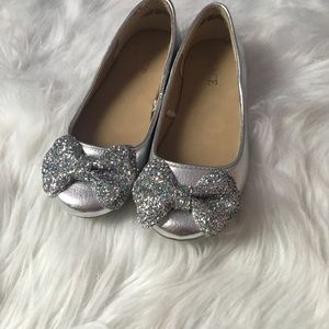 Girl’s silver shoes
